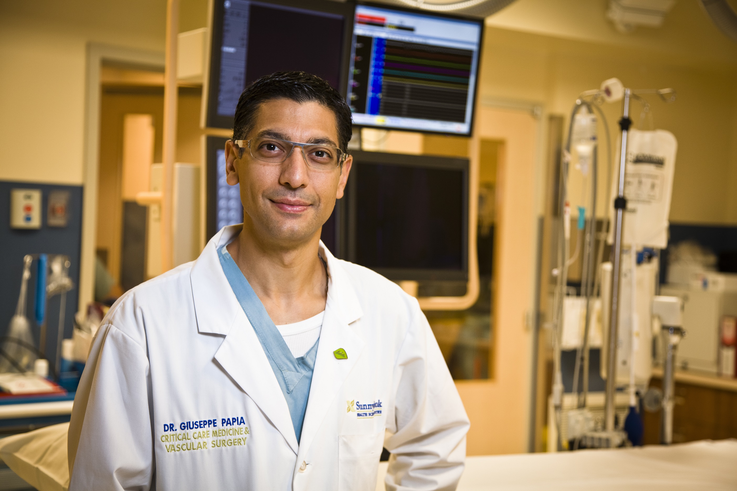 doctor standing in hospital room